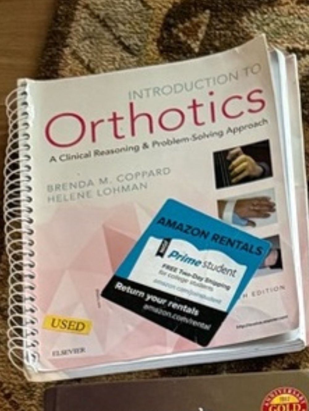 Introduction to Orthotics Textbook - Pink & White Cover